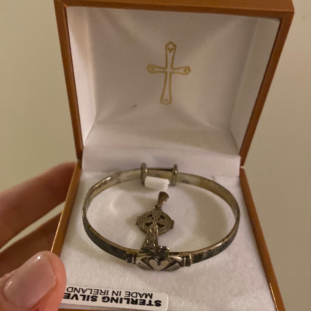 Never worn claddagh bracelet and Celtic cross